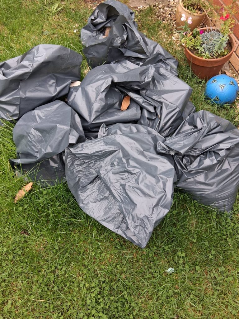 Bristol waste clearance truck loading unwanted items